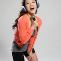 depositphotos 19318113-stock-photo-attractive-asian-girl-in-headphones