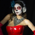 beautiful woman with custom designed candy skull mexican day of the dead face make up