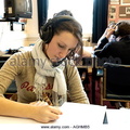 a-teenage-girl-in-a-language-laboratory-concentrating-on-an-as-spanish-aghmb5