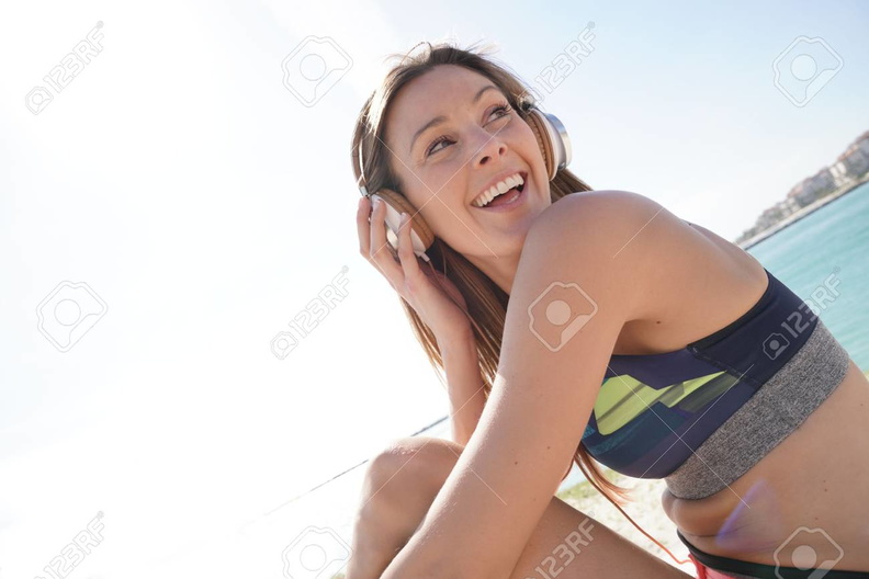 94662996-roller-skater-relaxing-and-listening-to-music-with-headphones.jpg