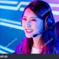 stock-photo-young-asian-pretty-pro-gamer-have-live-stream-and-chat-with-fans-happily-1576665223