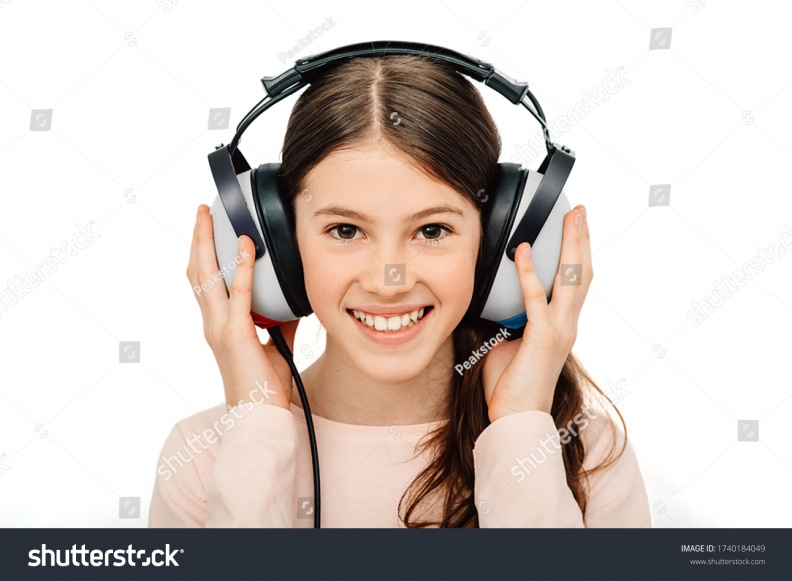 stock-photo-hearing-test-positive-girl-in-headphones-during-a-hearing-test-isolated-on-white-audiometry-1740184049.jpg
