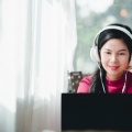 beautiful-asian-female-students-wearing-headphones-while-studying-online-teachers-students-use-online-video-conferencing-systems-teach-students 140555-503