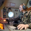 US Navy 031011-N-5362A-001 Aviation Warfare Systems Specialist 2nd Class Vickie Cokely, assigned to the  Grey Knights  of Patrol Squadron Forty Six (VP-46), works from her assigned sensor bay in the back of a P-3C O