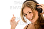 0035-0812-2818-2943 happy blond woman listening to music through headphones holding one to her ear