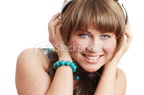 istockphoto 5345295-beautiful-woman-listening-music-in-headphones