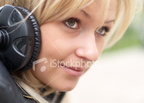 istockphoto 6062554 girl with earphones
