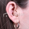 istockphoto 8166404-brunette-woman-with-modern-hearing-aid