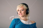 istockphoto 5051097 woman wearing headphones