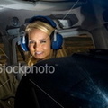 ist2 6279284-female-pilot-and-mature-co-pilot-in-cockpit