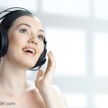 7325998-girl-with-headphones-on-the-blury-background