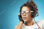 depositphotos 35710407-stock-photo-young-woman-with-headphones-listening