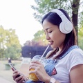 indonesian-girl-listening-music-with-headphones-and-smart-phone 1437-671