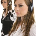 6933772-young-business-ladies-with-headsets-studio-on-isolated-white-background