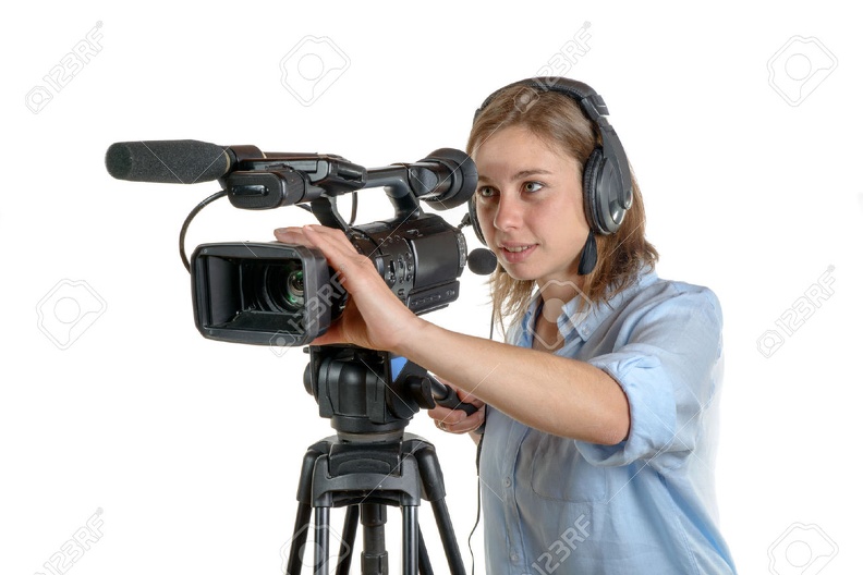 32869249-young-woman-with-a-video-camera-and-headphone-Stock-Photo