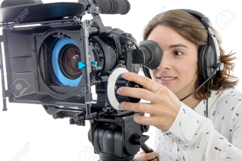 68354943-beautiful-young-woman-with-DSLR-video-camera-and-headphones-Stock-Photo.jpg