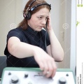 ear-exam-headphones-woman-having-30321663.jpg