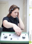 ear-exam-headphones-woman-having-30321663