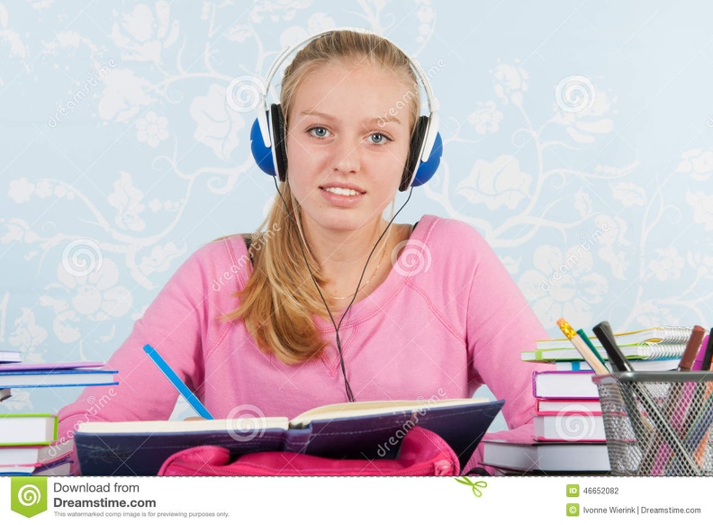high-school-student-homework-making-desk-music-headphones-46652082