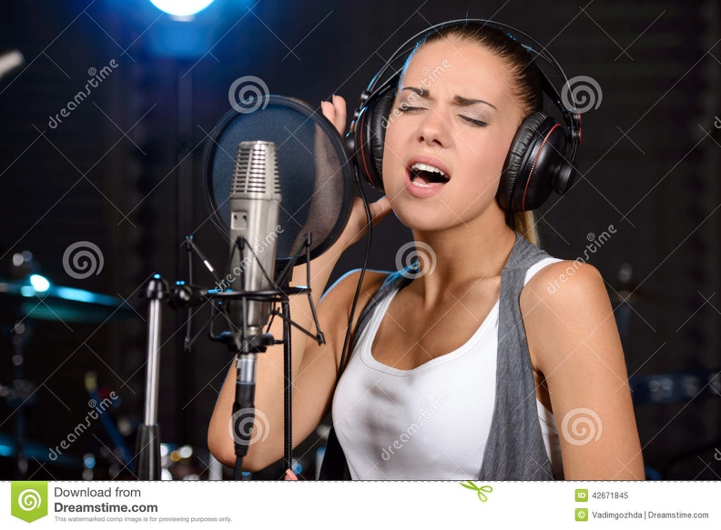 recording-studio-portrait-young-woman-song-professional-42671845.jpg