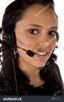 stock-photo-a-close-up-of-a-woman-with-a-headset-with-a-small-smile-on-her-face-44062495