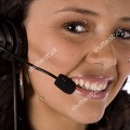 stock-photo-a-woman-with-a-headset-with-a-smile-on-her-face-talking-44062450