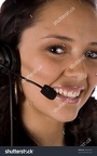 stock-photo-a-woman-with-a-headset-with-a-smile-on-her-face-talking-44062450