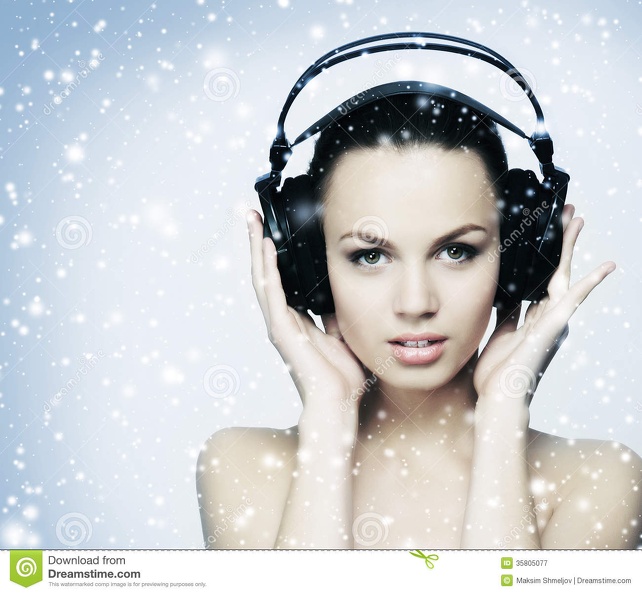 young-teenage-girl-listening-to-music-headphones-snow-fit-image-taken-light-blue-snowy-background-35805077.jpg
