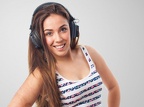 woman-smiling-with-headphones 1187-1468