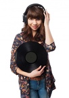 woman-with-headphones-holding-a-vinyl-record 1187-1516