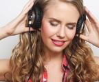 Blonde wearing Sony XB headphones II