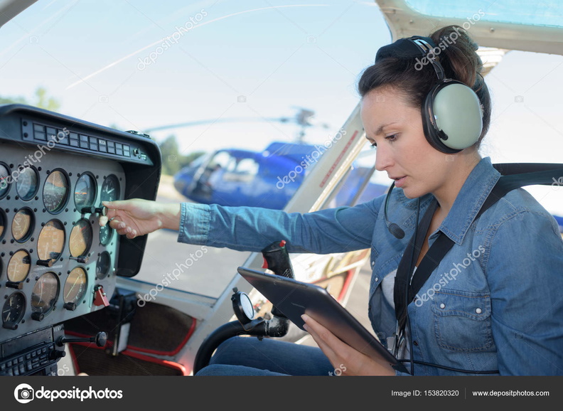 depositphotos_153820320-stock-photo-woman-in-the-cockpit-at.jpg