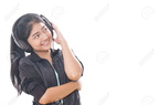 33468299-Young-woman-with-headphones-listening-music--Stock-Photo