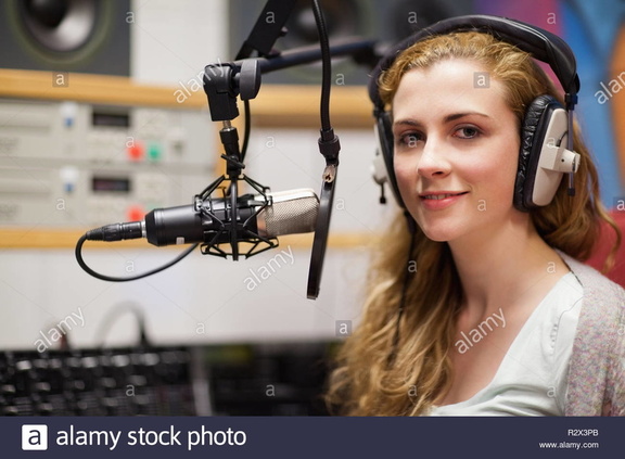 pretty girl in her big studio headphones