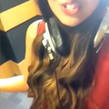 girl wearing her big studio headphones around her neck 7