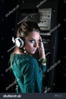 stock-photo-attractive-girl-dj-in-sound-room-with-headphones-3028071