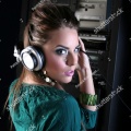 stock-photo-attractive-girl-dj-in-sound-room-with-headphones-3028107