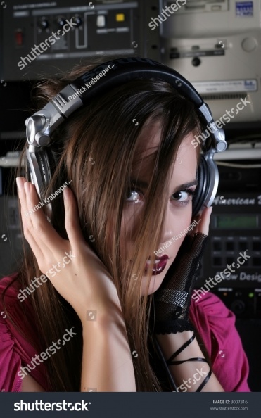 stock-photo-girl-dj-with-headphones-wearing-a-pink-shirt-3007316.jpg