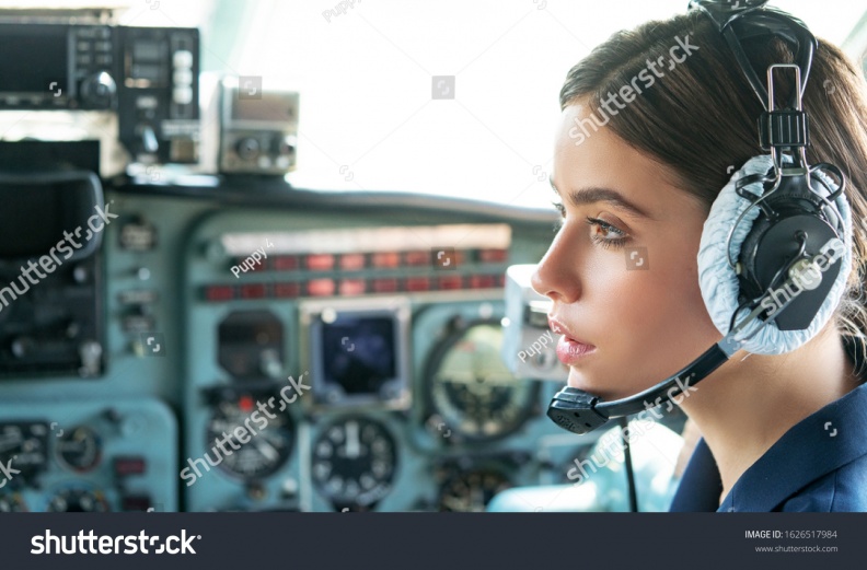 stock-photo-operatore-in-avia-company-persons-crew-pilots-stewardess-airplane-command-civil-aviation-young-1626517984.jpg