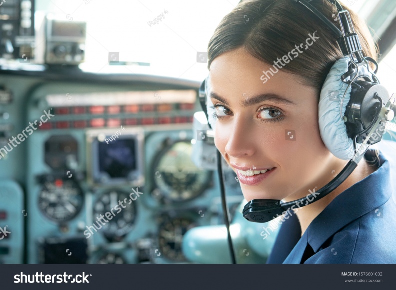 stock-photo-pilot-and-stewardess-female-pilot-smiles-and-wishes-a-successful-flight-avia-company-persons-crew-1576601002.jpg