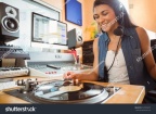 stock-photo-portrait-of-an-university-student-with-a-turn-table-in-the-studio-of-a-radio-243995875