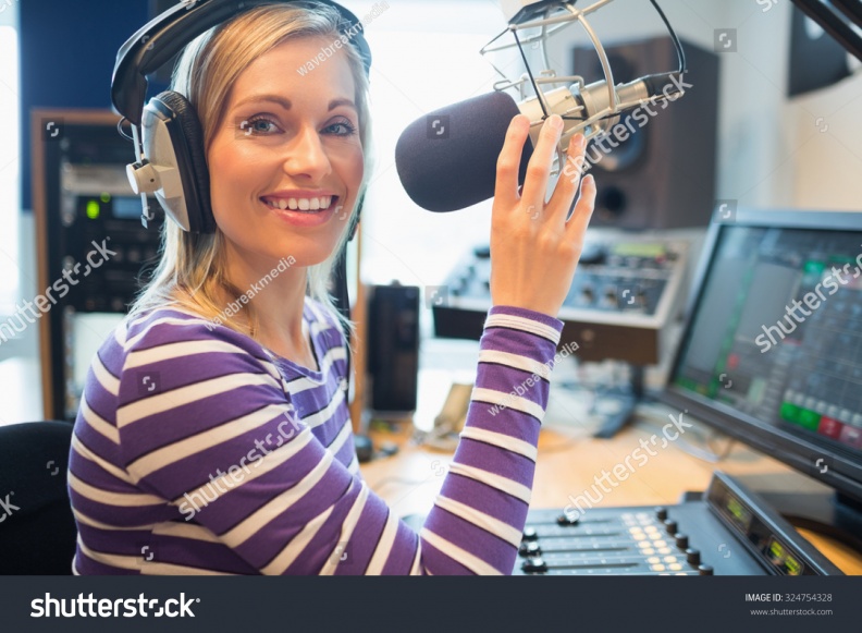 stock-photo-portrait-of-happy-young-female-radio-host-broadcasting-in-studio-324754328.jpg
