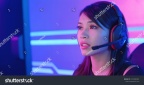 stock-photo-young-asian-pretty-pro-gamer-having-live-stream-and-playing-in-online-video-game-1530580985