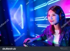 stock-photo-young-asian-pretty-pro-gamer-having-live-stream-and-playing-in-online-video-game-1569683377