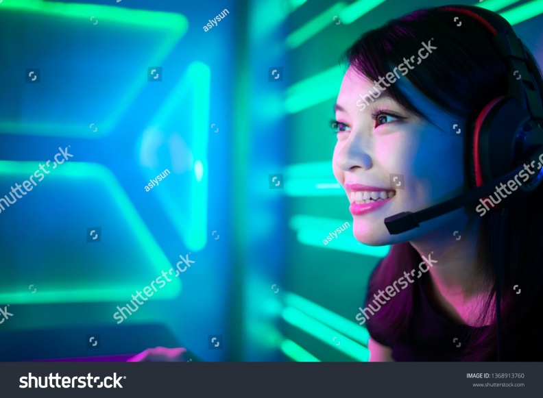 stock-photo-young-asian-pretty-pro-gamer-playing-in-online-video-game-1368913760