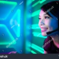 stock-photo-young-asian-pretty-pro-gamer-playing-in-online-video-game-1368913760