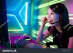 stock-photo-young-asian-pretty-pro-gamer-win-in-online-video-game-1399148099