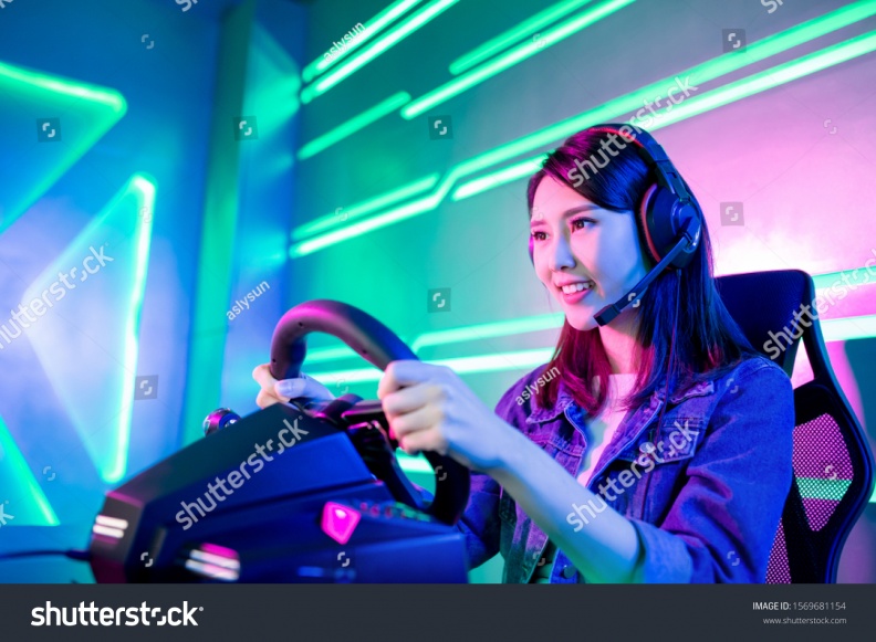 stock-photo-young-asian-pro-gamer-girl-play-car-racing-online-video-game-1569681154.jpg
