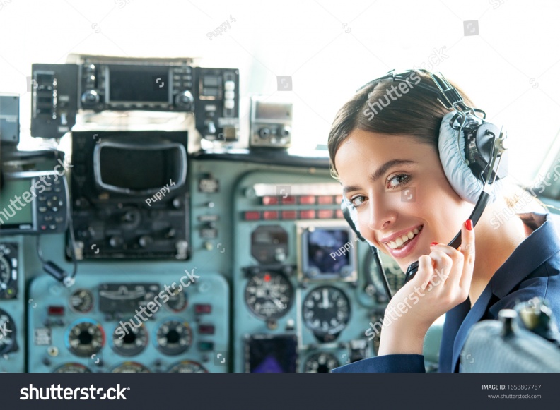 stock-photo-young-friendly-operator-woman-agent-with-headsets-working-in-a-avia-call-centre-operatore-in-avia-1653807787.jpg