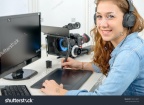 stock-photo-young-woman-designer-using-a-graphics-tablet-for-video-editing-790414837
